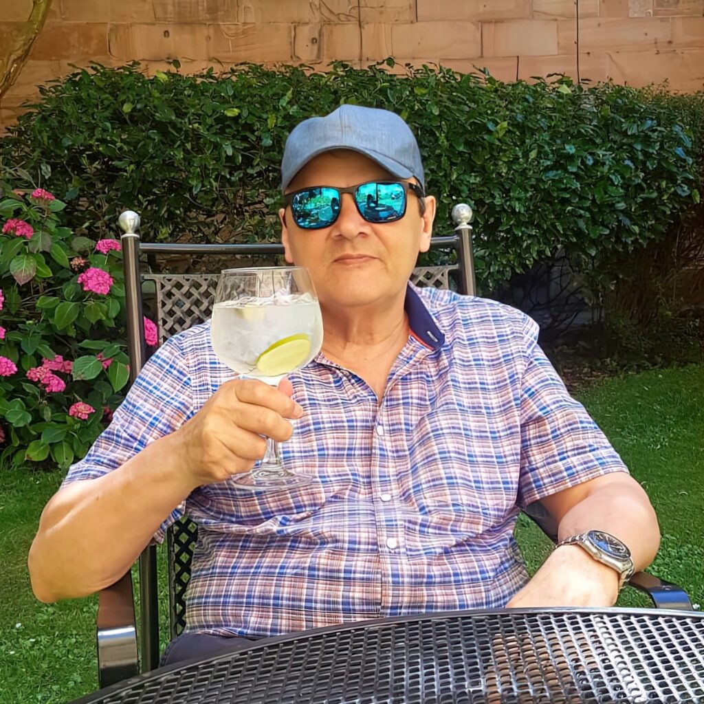 Alan Millin Image showing author Alan Millin, raising a glass